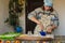 Beautiful woman prepares dumplings in her home kitchen, dumplings with potatoes