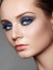 Beautiful Woman with Professional Makeup. Celebrate Style Eye Make-up, Perfect Eyebrows, Shine Skin. Bright Fashion Look