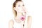 Beautiful woman with a proud look. Woman with clean and smooth skin. Woman with pink flower. Moisturize.