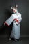 Beautiful woman rabbit in white kimono. Halloween makeup and costume