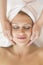 Beautiful Woman Receiving Facial Massage In Spa
