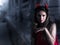 Beautiful woman in red dress and horns. Halloween