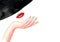 Beautiful woman with red lips, black hat, hand with LGBT flag colors manicure nails