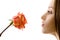 Beautiful woman with rose sideview isolated