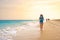 Beautiful woman running on sunny beach Santa Maria, Sal Island, Cape Verde