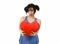 Beautiful woman smiling happy feeling in love holding red heart shape pillow