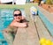 Beautiful woman smiling in a swimming pool