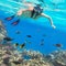 Beautiful woman snorkeling in Red Sea