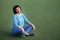 Beautiful woman in the stadium. Portrait of a fitness woman resting at outdoor stadium