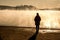 Beautiful woman standing lake of two rivers algonquin national park Canada look sunrise mist in the fog clouded swamp