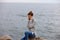 beautiful woman sweaters cloudy sea admiring nature Relaxation concept