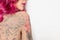 Beautiful woman with tattoos on body against background, closeup. Space for text