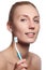 Beautiful woman with toothbrush. Dental care background. Closeup