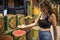 Beautiful woman tourist visits a store selling spices in the Jemaa el Fna square in the city of Marrakech in Morocco