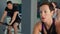 Beautiful woman training on cycling class in gym. Portrait fitness woman training on indoor bike on bicycle gym. Sport