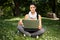 Beautiful woman using laptop in park