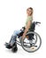 Beautiful woman in wheelchair on white background