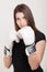 Beautiful woman with white boxing gloves