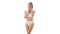 Beautiful woman in white underwear over isolated white background. Studio video of healthy young girl in swimsuit