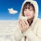 Beautiful Woman with winter anorak and mug