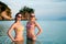 Beautiful women in bikini standing in water