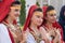 Beautiful women in traditional Albanian costumes posing for photo during annual Skopje festival of music and dance