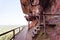 Beautiful Wooden bridge in red cliffside at Wat Phu tok mountain. Bueng Kan, Thailand