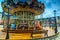 Beautiful wooden colorful French Carousel in Honfleur, Normandy, France, Europe
