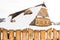 Beautiful wooden cottage covered in snow, ski resort Donovaly