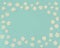 Beautiful wreath white flowers on vintage blue background, close