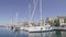 Beautiful yachts stand in the marina for boats and tourist ships. Many yachts in French docks. Narbonne, France