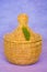 Beautiful yellow knitted basket from a vine