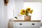 Beautiful yellow sunflowers on chest of drawers in room, space for text
