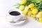 Beautiful Yellow Tulips on White Wooden Background Cup of Coffee Breakfast Morning Holiday Birthday Composition