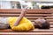 Beautiful young african american woman lying on bench looking at mobile phone