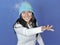 Beautiful young Asian woman blowing snow - winter