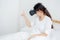 Beautiful young asian woman cheerful and fun wearing vr virtual reality headset, girl device and watching simulator game