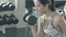 Beautiful young asian woman training workout with strong at gym, asia girl bodyweight with lifting dumbbell at fitness