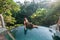 Beautiful young balinese girl at pool outdoor