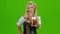 Beautiful young blond girl of oktoberfest beer stein