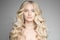 Beautiful Young Blond Woman With Long Wavy Hair.