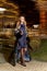 Beautiful young blonde wearing evening makeup in elegant fitting dress fashionable stylish expensive fur coat walk night stre