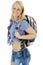 Beautiful young blonde woman hiking as a backpacker in studio