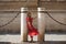 Beautiful young blonde woman from the United States is on a sightseeing trip in Seville, Spain. The girl leans between the columns