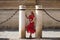 Beautiful young blonde woman from the United States is on a sightseeing trip in Seville, Spain. The girl leans between the columns