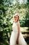 Beautiful young bride in the garden background