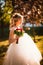 Beautiful young bride in the garden background