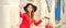 Beautiful young caucasian woman in black hat looking on the smartphone smiling and sitting on stairs at the door