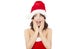 Beautiful young christmas woman making a funny expression