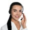 Beautiful young consulting manager with headset on white background